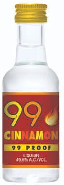 Front view of the clear bottle of 99 Cinnamon Liqueur with a gold cap.