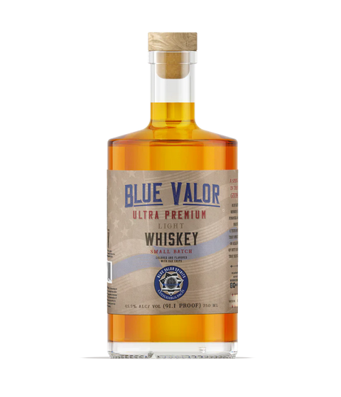 Detail close-up of Blue Valor Whiskey bottle with amber color and cork stopper
