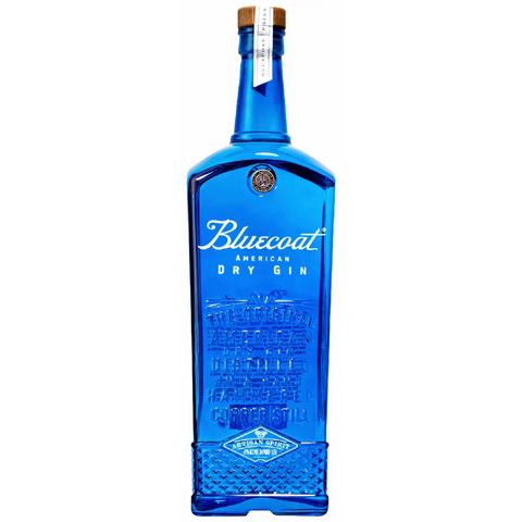Bluecoat American Dry Gin front view in a tall blue bottle with a cork stopper.