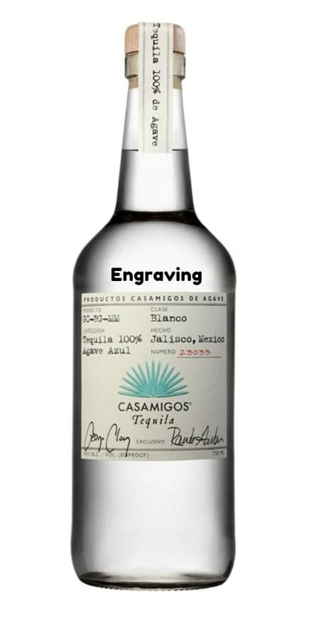 Front view of the clear Casamigos Blanco tequila bottle with engraved label.