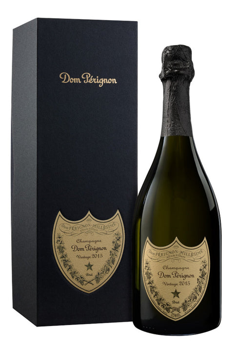 Dom Pérignon 2015 champagne bottle with gold label and gift box packaging