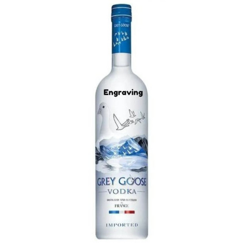 Front view of the clear Grey Goose vodka bottle with engraved design and blue cap