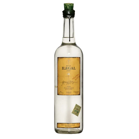Front view of the clear glass bottle of Illegal Mezcal with a green cap.