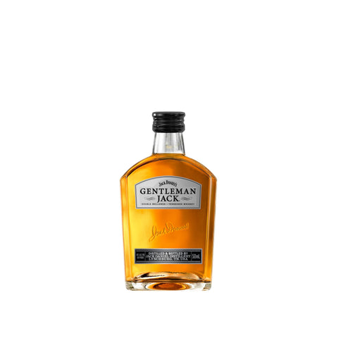 Front view of the amber whiskey bottle with a label and cork stopper