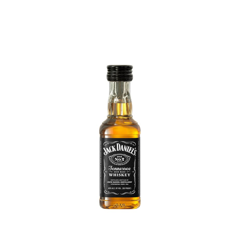 Front view of a small brown bottle of whiskey with a label and screw cap