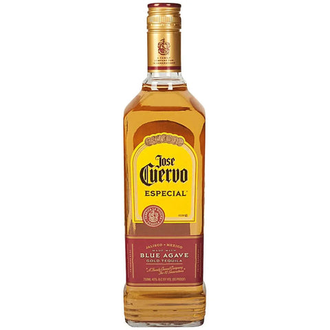 Front view of the gold tequila bottle featuring a label design and gold cap.