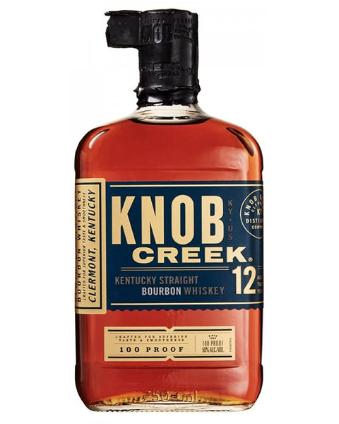 Knob Creek Bourbon front view of square bottle with black cap and label.