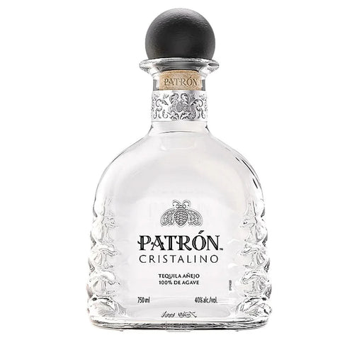 Front view of the clear Patron Cristalino tequila bottle with gold and black details