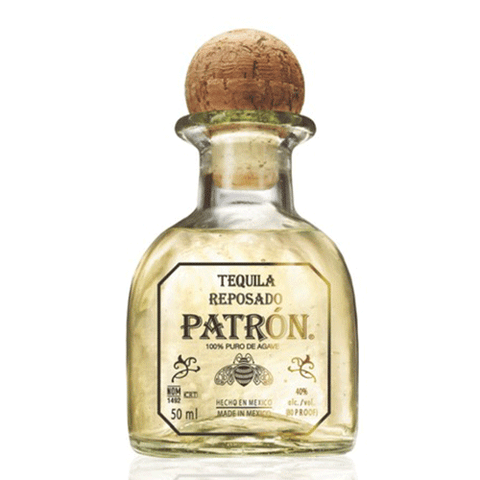 Front view of the clear Patrón tequila bottle with a cork stopper.