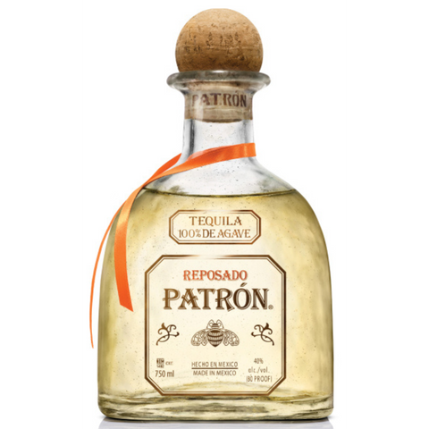 Front view of the clear and gold Patron Reposado tequila bottle with cork stopper.