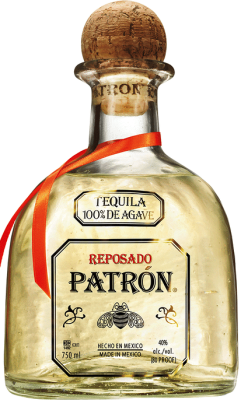 Front view of the clear and gold Patron Reposado tequila bottle with cork stopper.