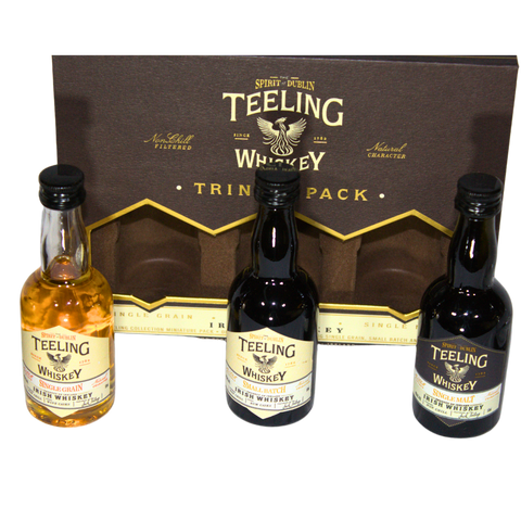 Teeling Irish Whiskey Taster Set with three whiskey bottles and gold accents, packaging view.